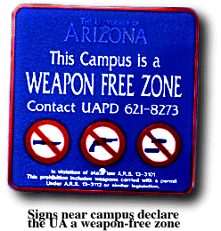{Signs near campus declare the UA a weapon-free zone}